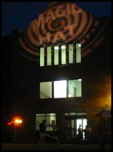 gobo of company logo projected on outside of building