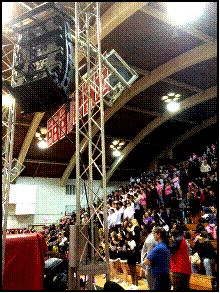 Basketball game with line array speakers show on truss supports at Fairfield University Alumni Hall - Spence Sound & stage